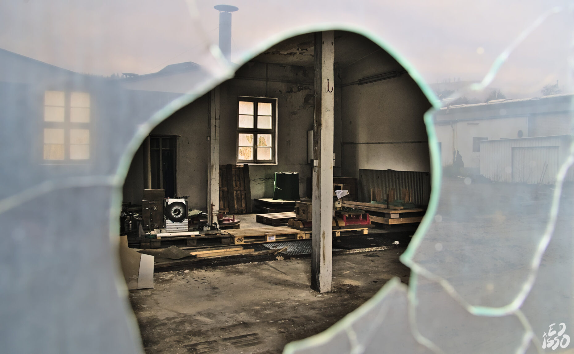 Workshop through a broken window